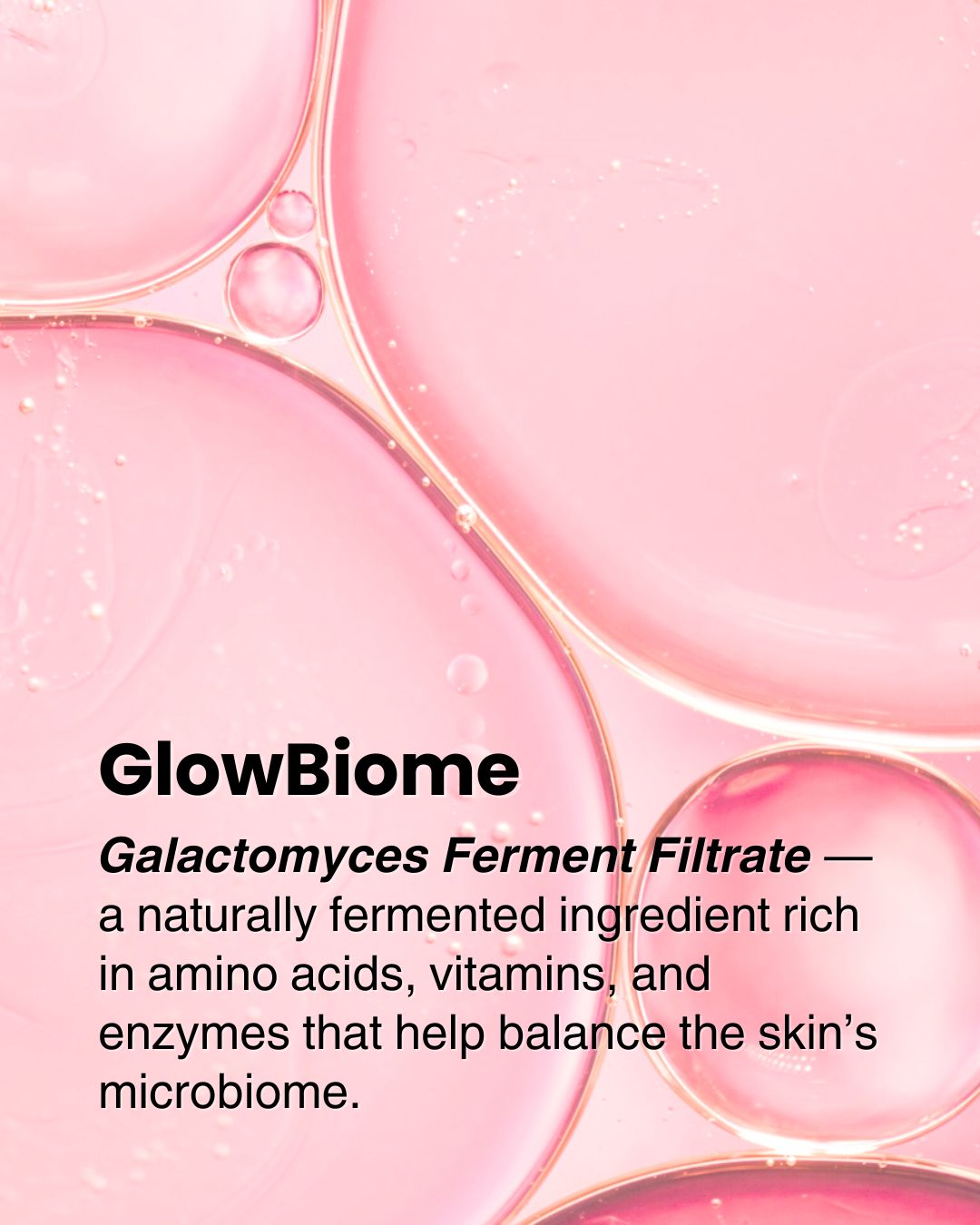 Close-up of pink liquid with text about GlowBiome skincare ingredients.