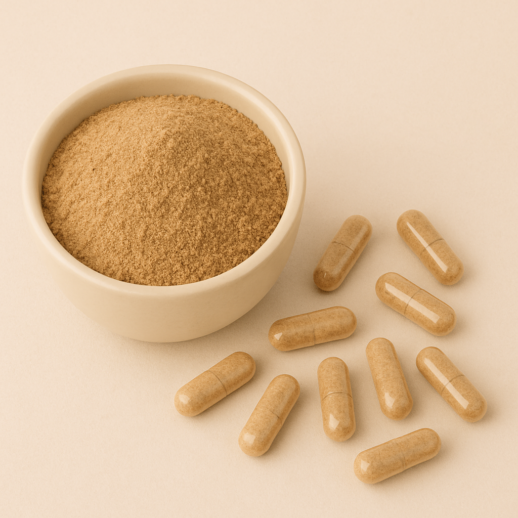 Bowl of brown powder with scattered capsules on a beige background.