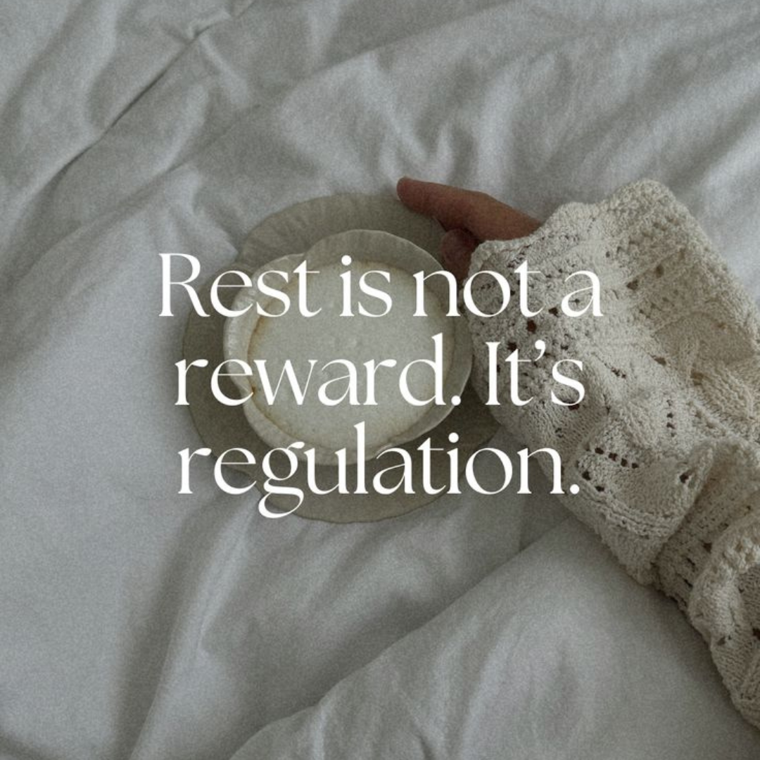 Text 'Rest is not a reward. It's regulation.' over a hand in a knit sleeve holding a cup.