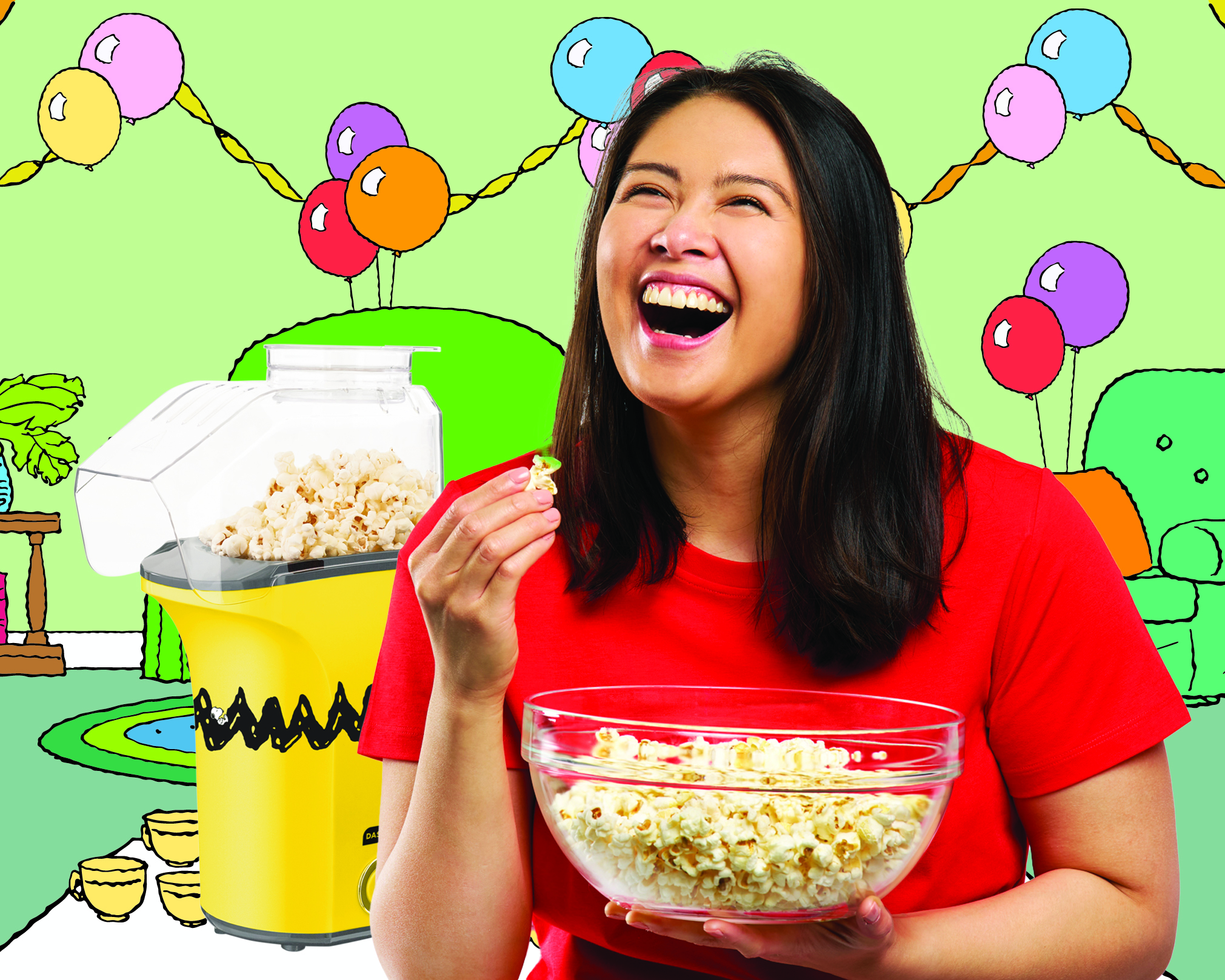 Woman enjoying fresh popcorn made with the Dash x Peanuts® Popcorn Maker — perfect for parties, movie nights, and fun at home.