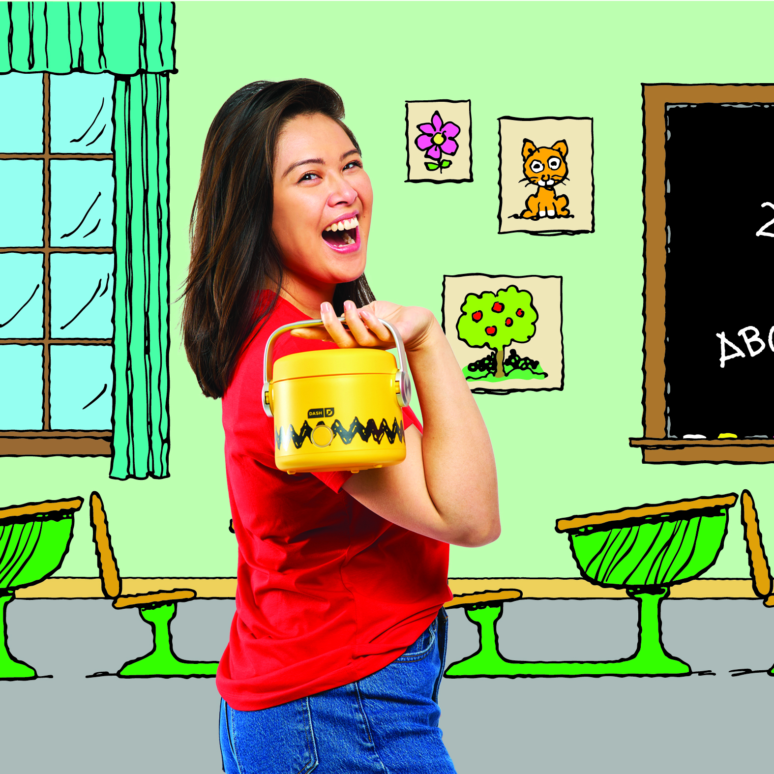 Smiling woman holding Dash x Peanuts® yellow multicooker with a cartoon classroom background — fun and easy meals on the go.