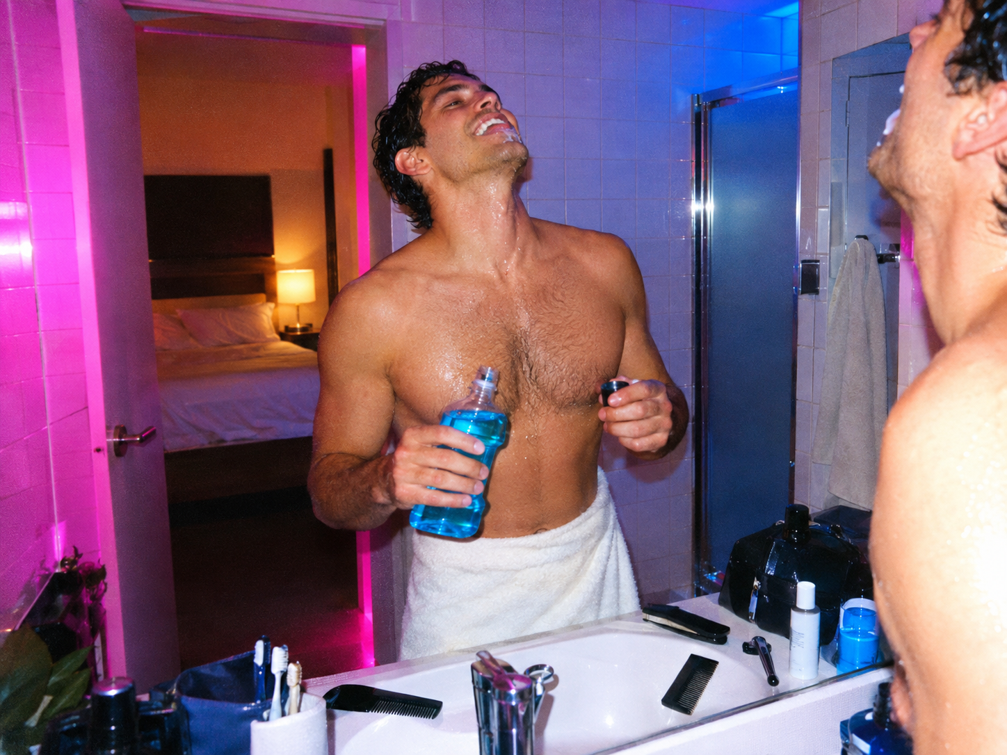 A man getting ready alone in his bathroom before a date, mid gargle