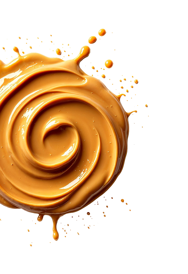 Swirl of caramel sauce with splashes on a black background.