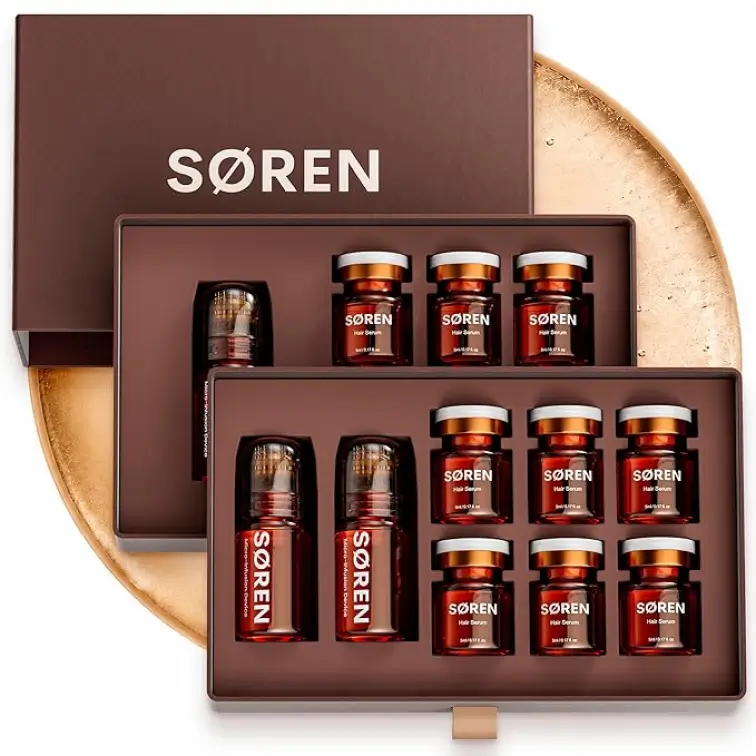 A SØREN hair serum gift set with multiple vials and applicators in a brown presentation box.