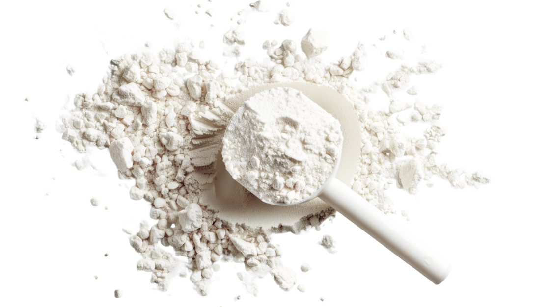 A scoop of white protein powder on a black background.