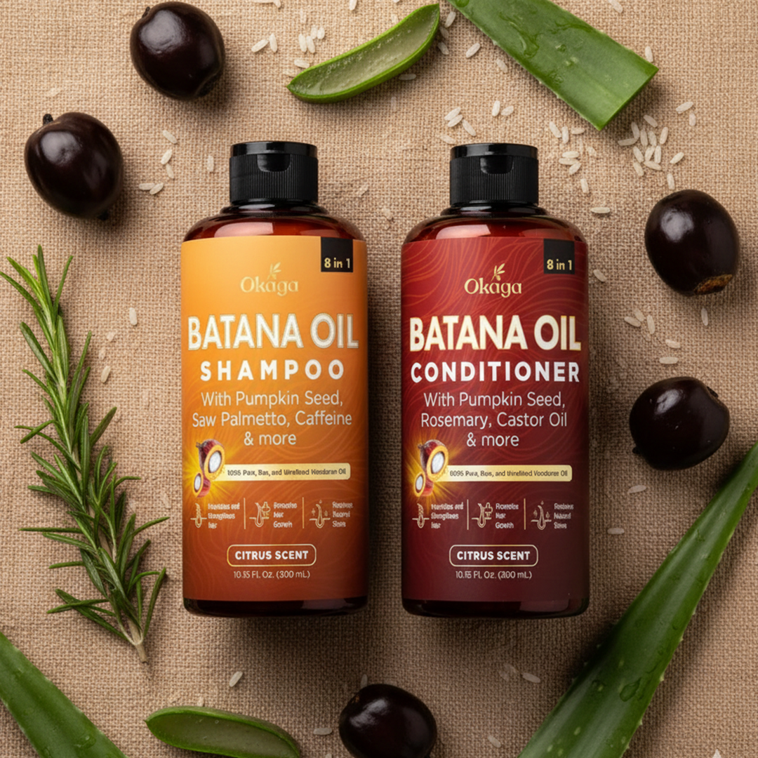 Flatlay of Okaga Batana Oil Shampoo and Conditioner bottles on a natural fabric background, surrounded by aloe vera slices, rosemary sprigs, palm fruits, and scattered rice grains.