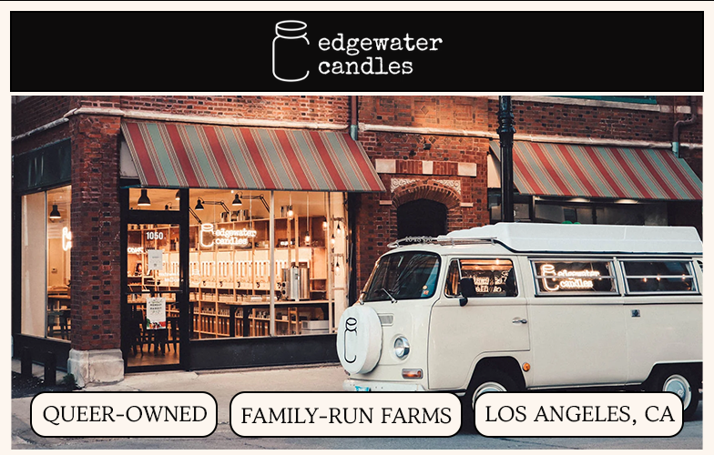 The Edgewater Candles brick storefront with a vintage white van parked in front.