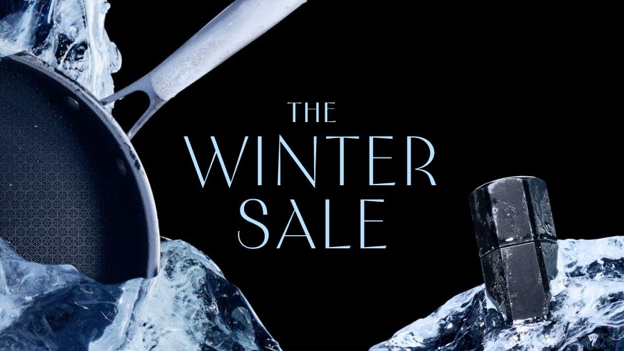A frying pan and a grinder sit in blocks of ice with the text 'The Winter Sale'.
