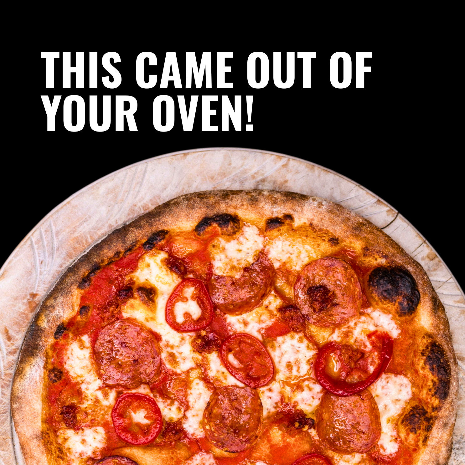 A freshly baked pepperoni pizza on a pizza peel with text overlay saying 'THIS CAME OUT OF YOUR OVEN!'