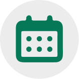 A green icon of a calendar with six dots, set inside a light gray circle.