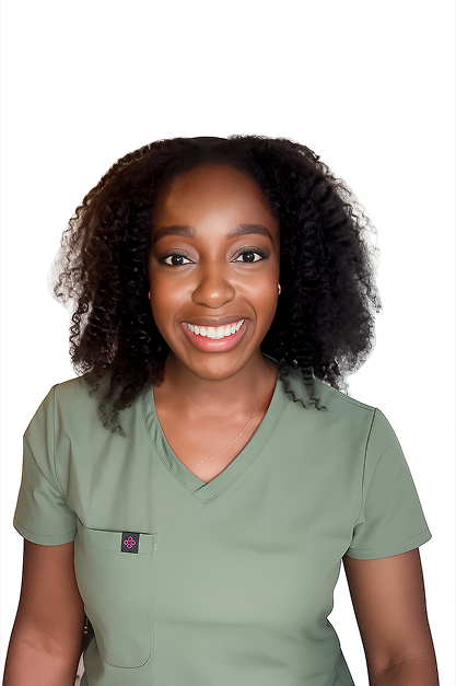Person smiling, wearing a green scrub top against a plain white background.