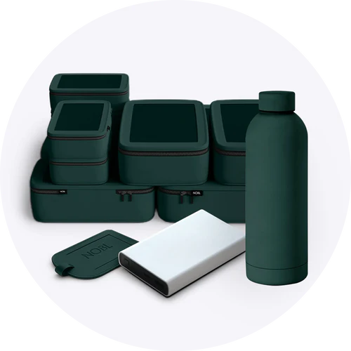 A collection of dark green travel cases, a water bottle, and a white power bank.