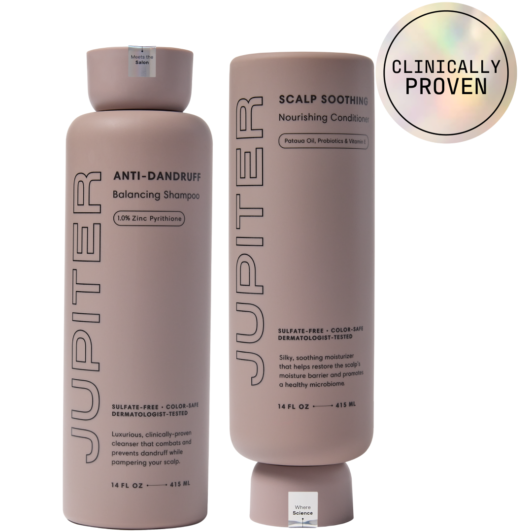 Two Jupiter hair care bottles with clinically proven label.