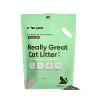 A light green bag of Tuft and Paw brand 'Really Great Cat Litter' on a black background.