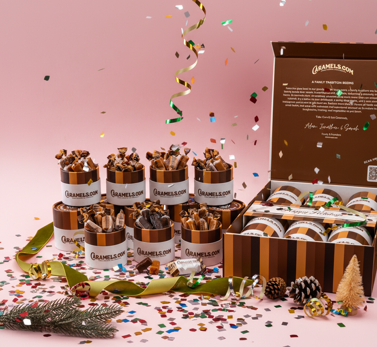 Assorted caramel boxes surrounded by confetti on a pink background.