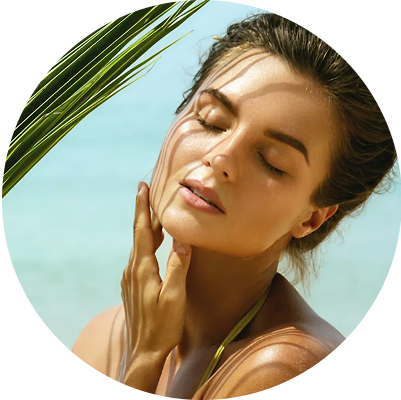 Woman with closed eyes, touching face, near beach with palm leaves.
