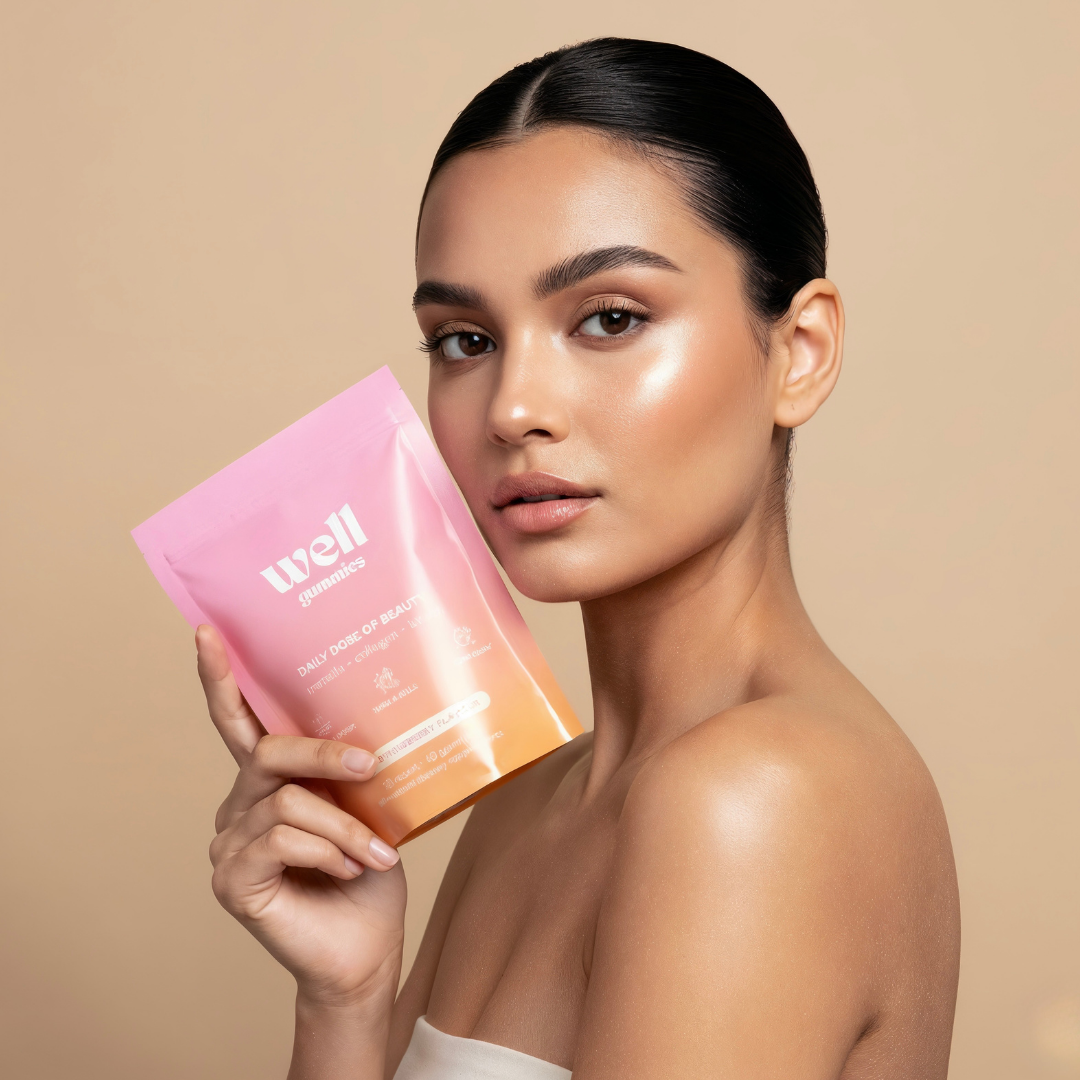 Person holding a pink and orange product package against a beige background.