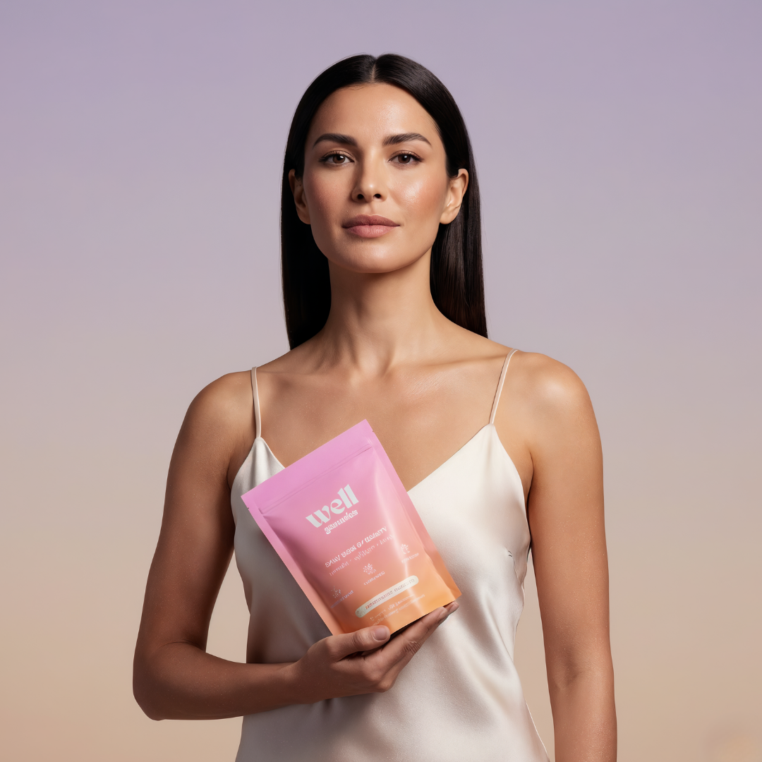 Person holding a colorful product package against a gradient background.