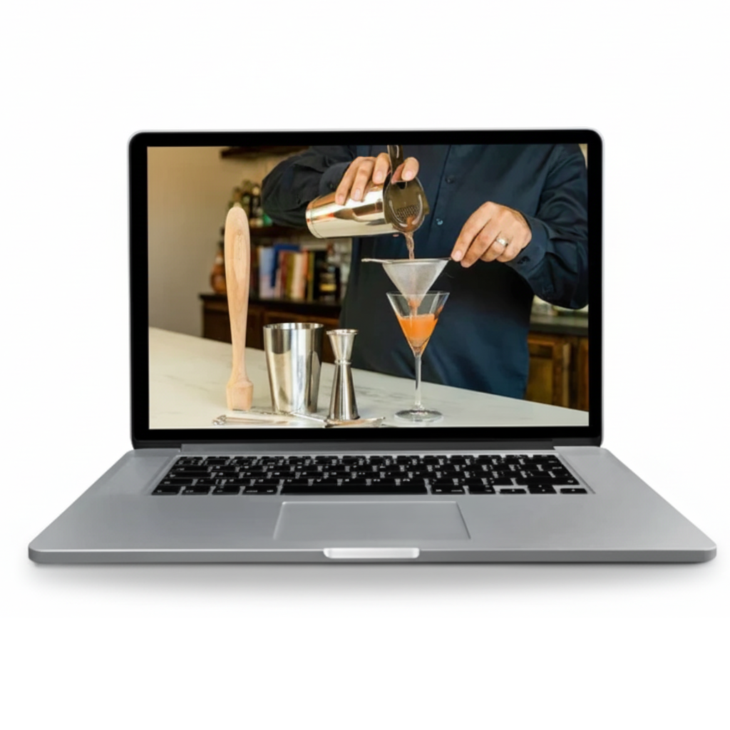 Laptop displaying a bartender preparing a cocktail.