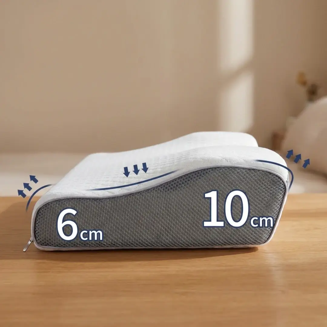 A contoured pillow on a table with graphics showing heights of 6 cm and 10 cm.