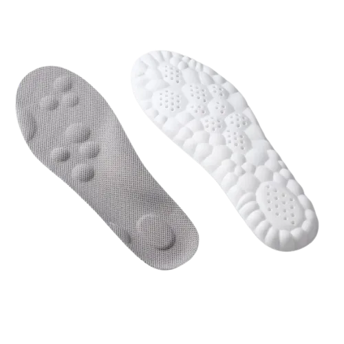 Two textured shoe insoles, one gray and one white.