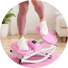 A person in pink leggings and white sneakers uses a pink mini stepper exercise machine on a pink mat.