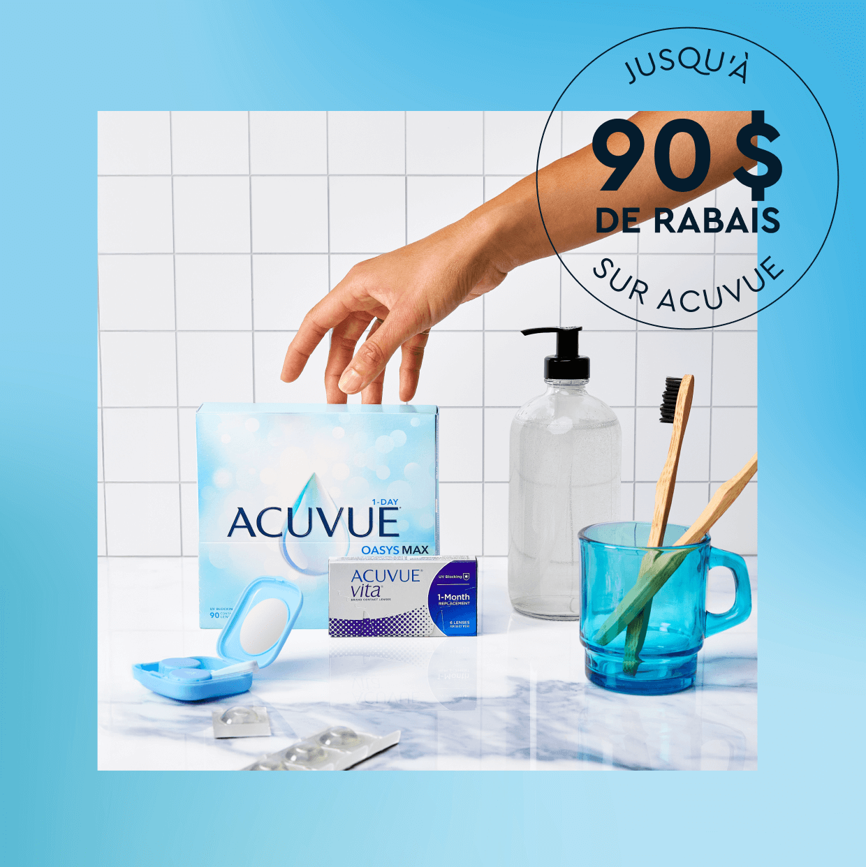 Hand reaching for Acuvue contact lens box on bathroom counter with toothbrushes and soap dispenser.