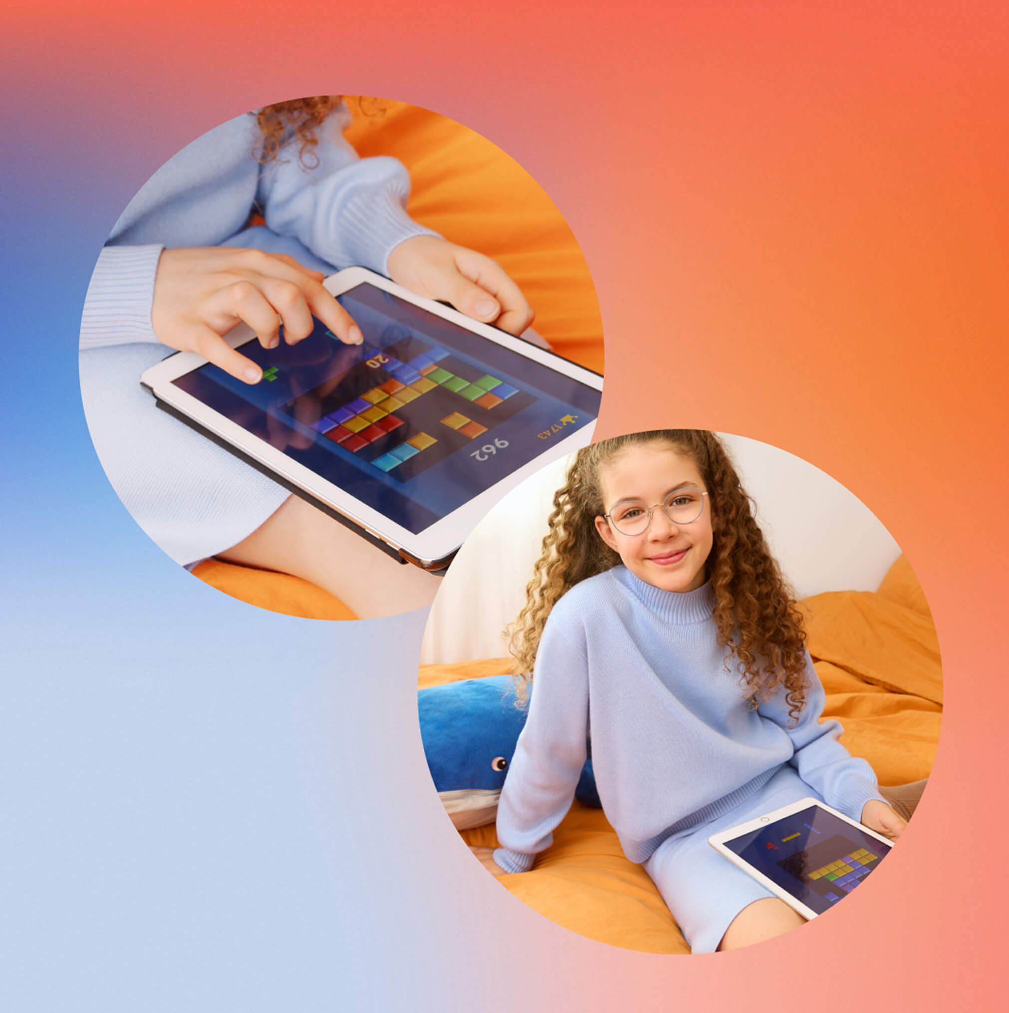 Girl in blue sweater playing a game on a tablet, sitting on an orange bed.