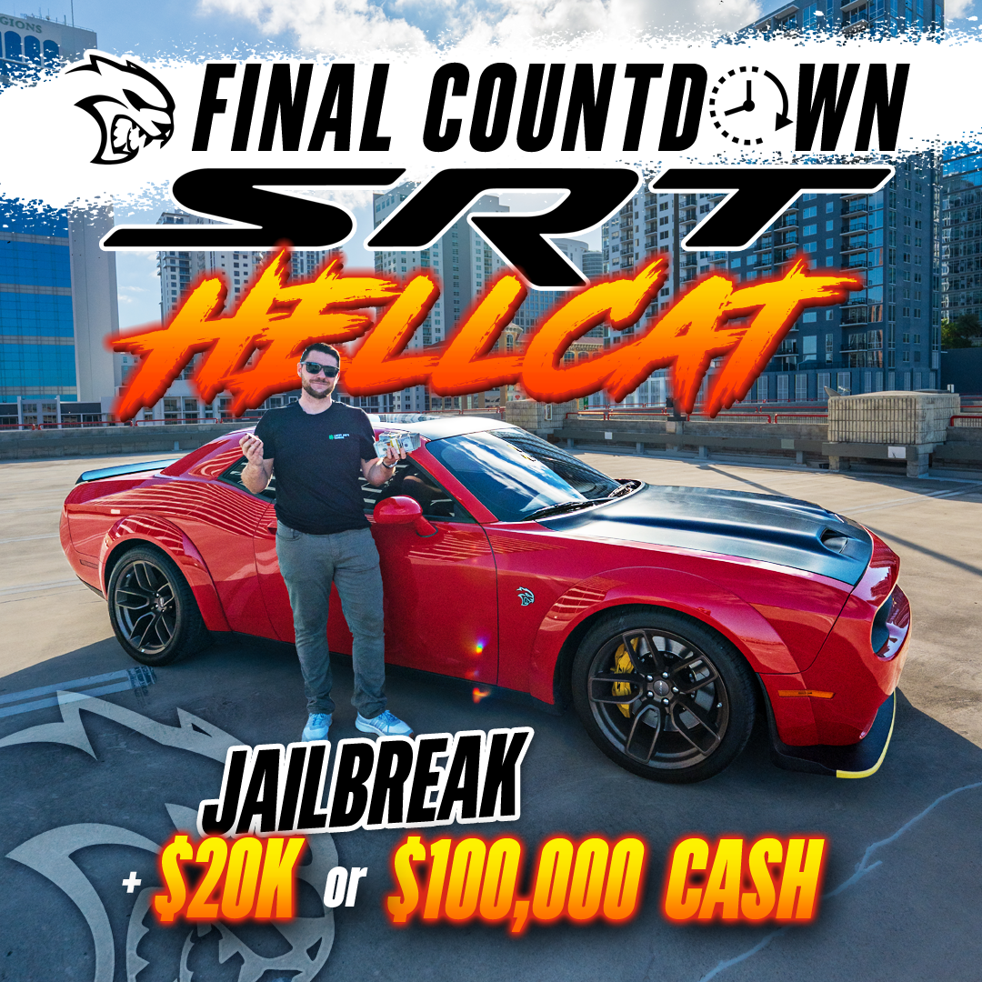 A man holds cash while standing next to a red Dodge Challenger SRT Hellcat on a rooftop.