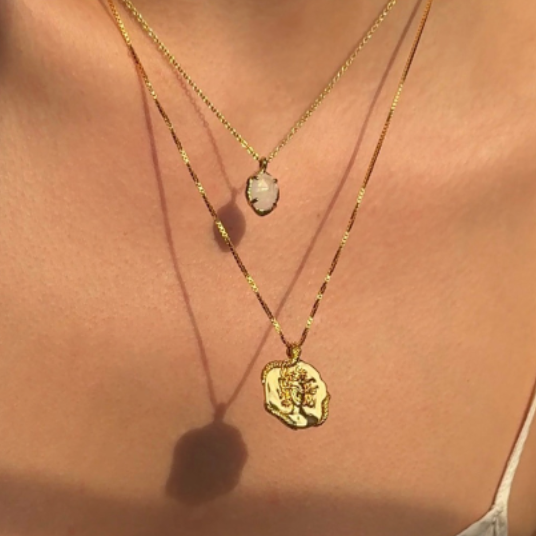 Layered moonstone and Medusa gold neckaces