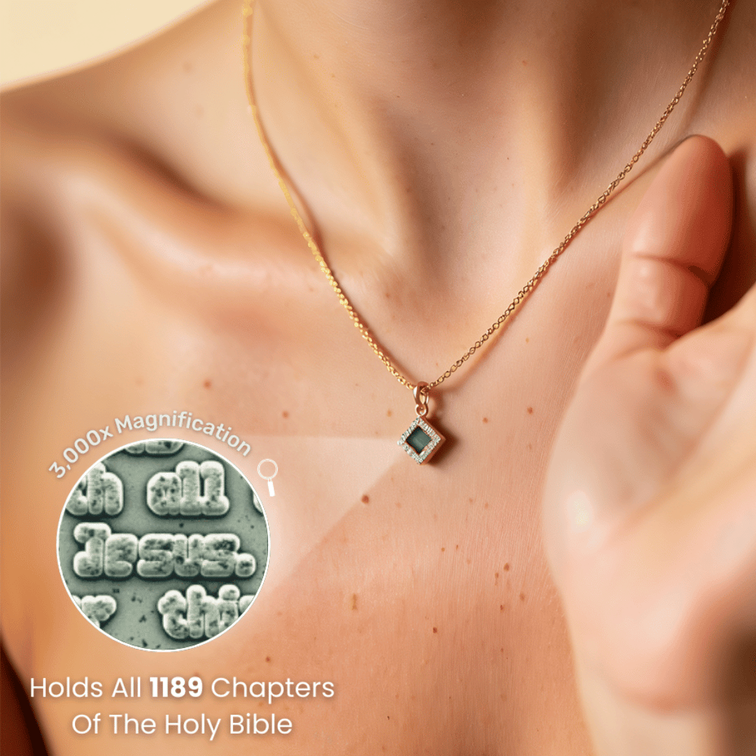 Gold necklace with a small pendant, magnified text detail shown.