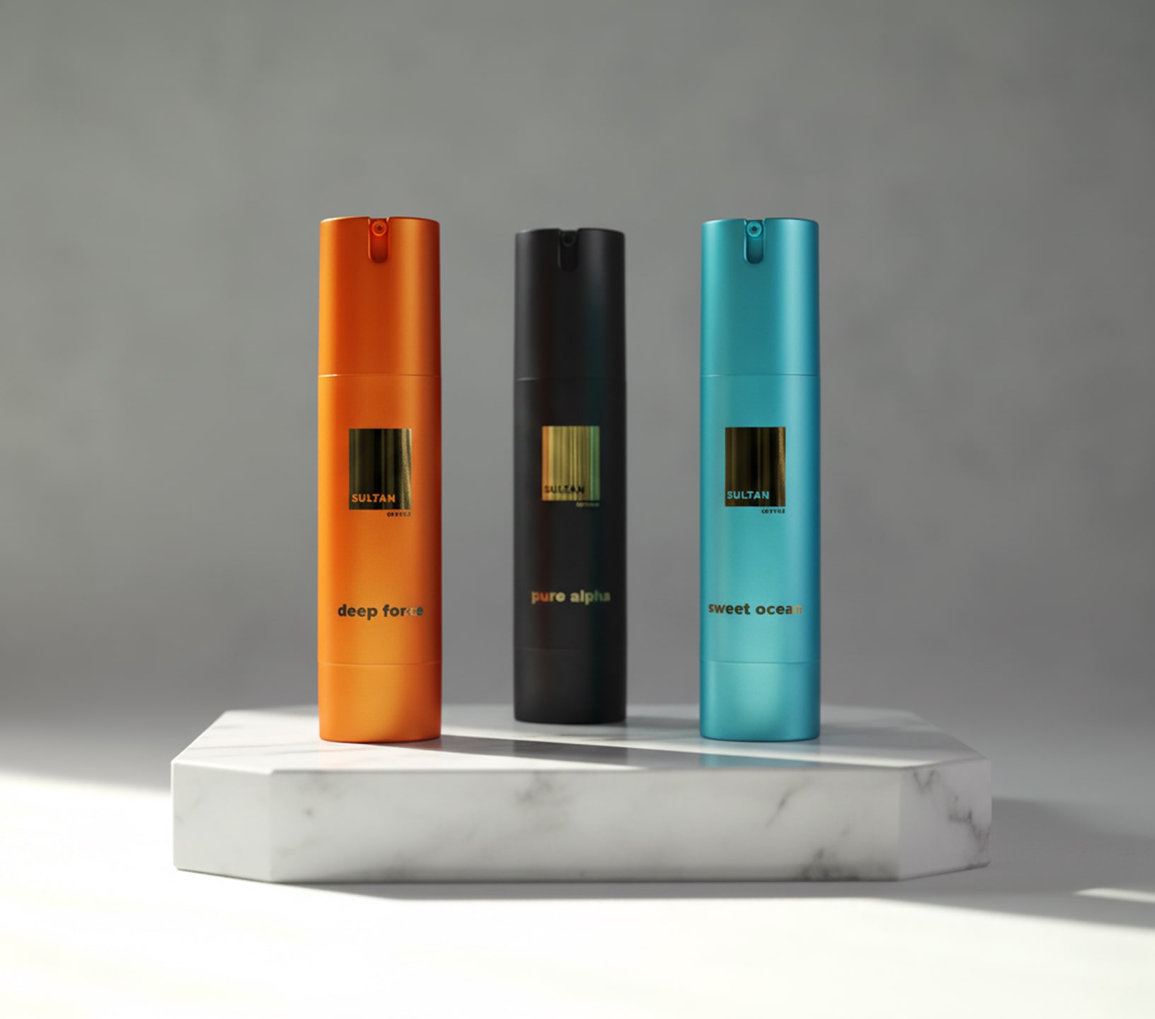 Three cylindrical bottles on a marble platform, in orange, black, and blue.