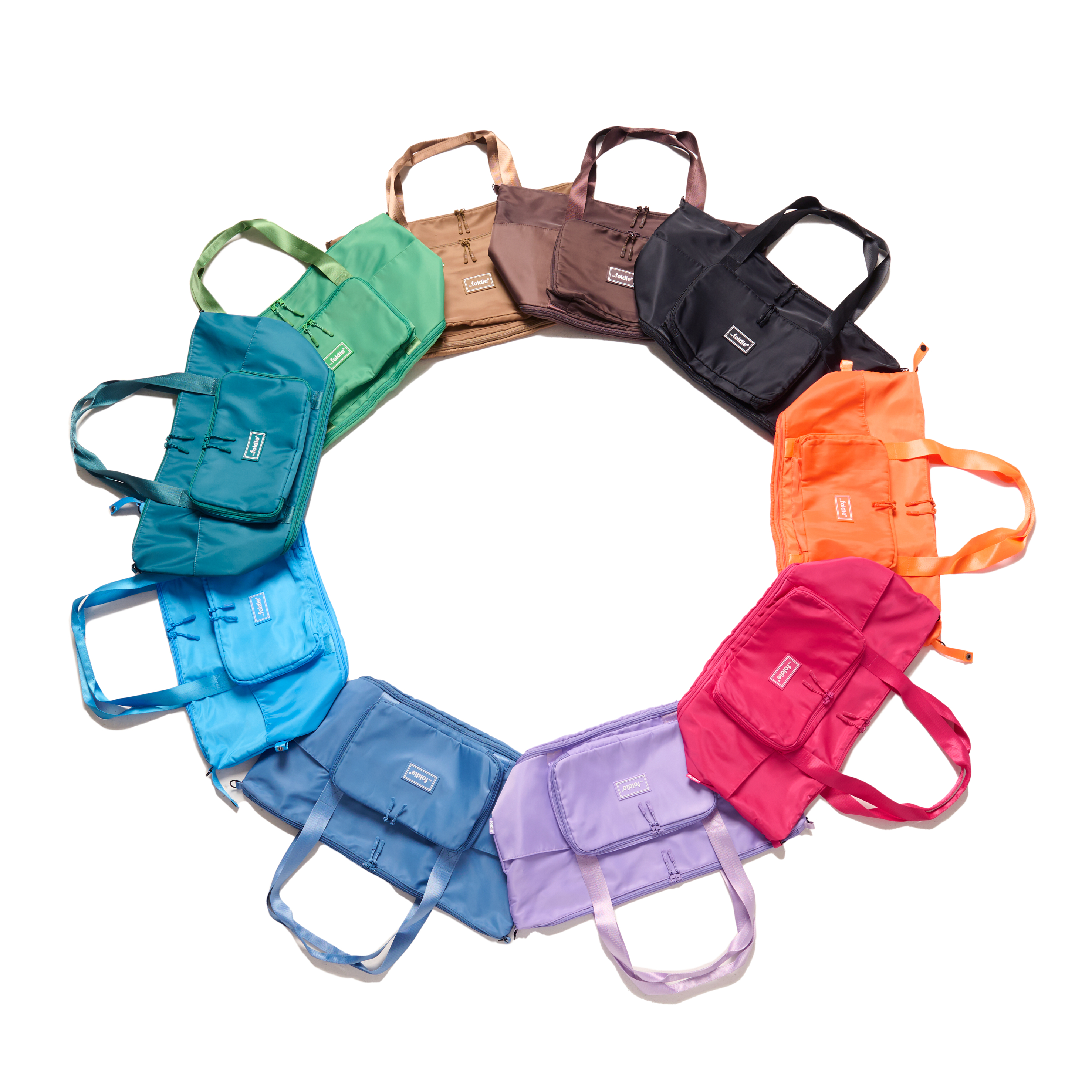 A circle of colorful tote bags arranged neatly on a white background.