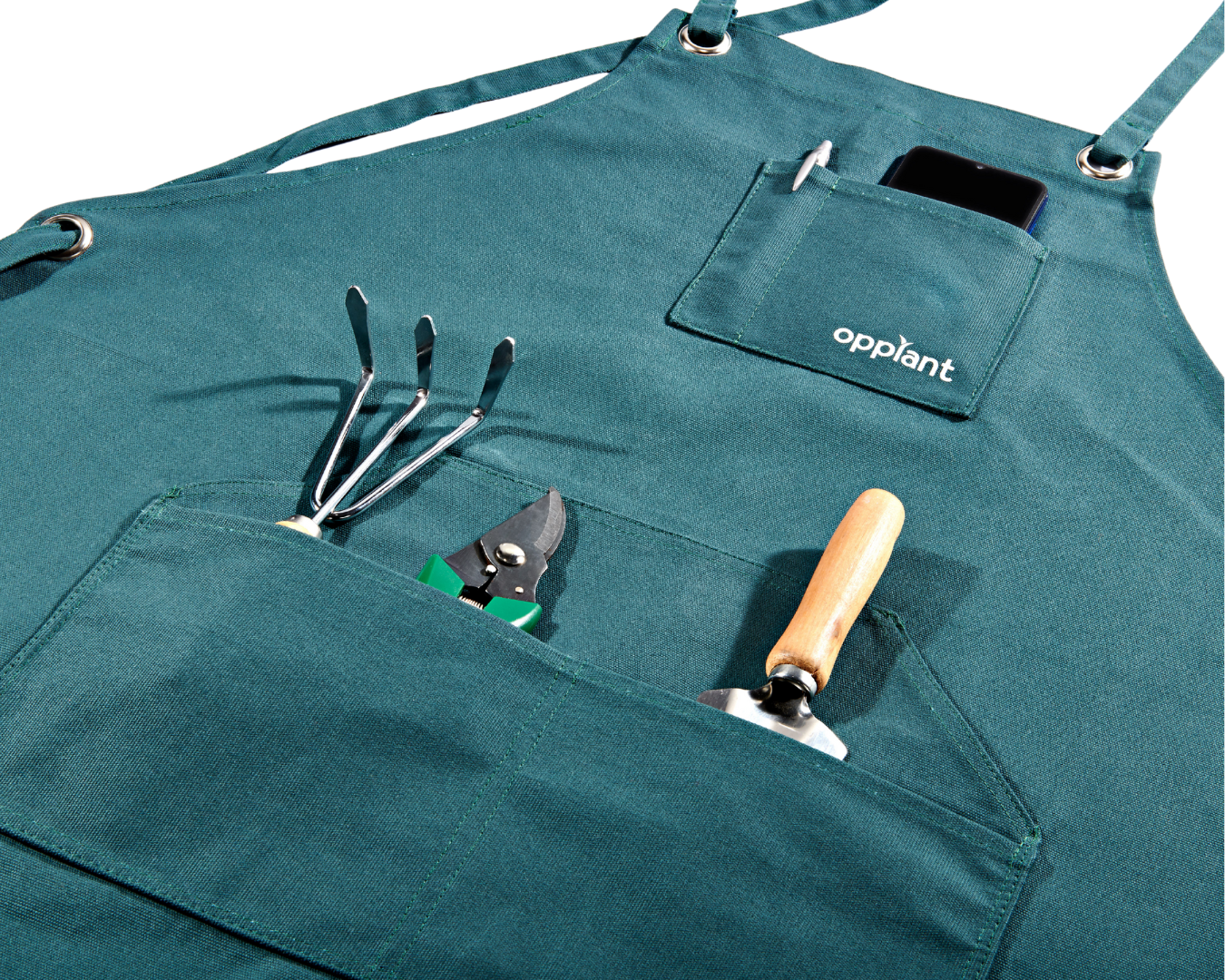 A stack of books titled 'The Type Book' beside a vase with blue flowers.