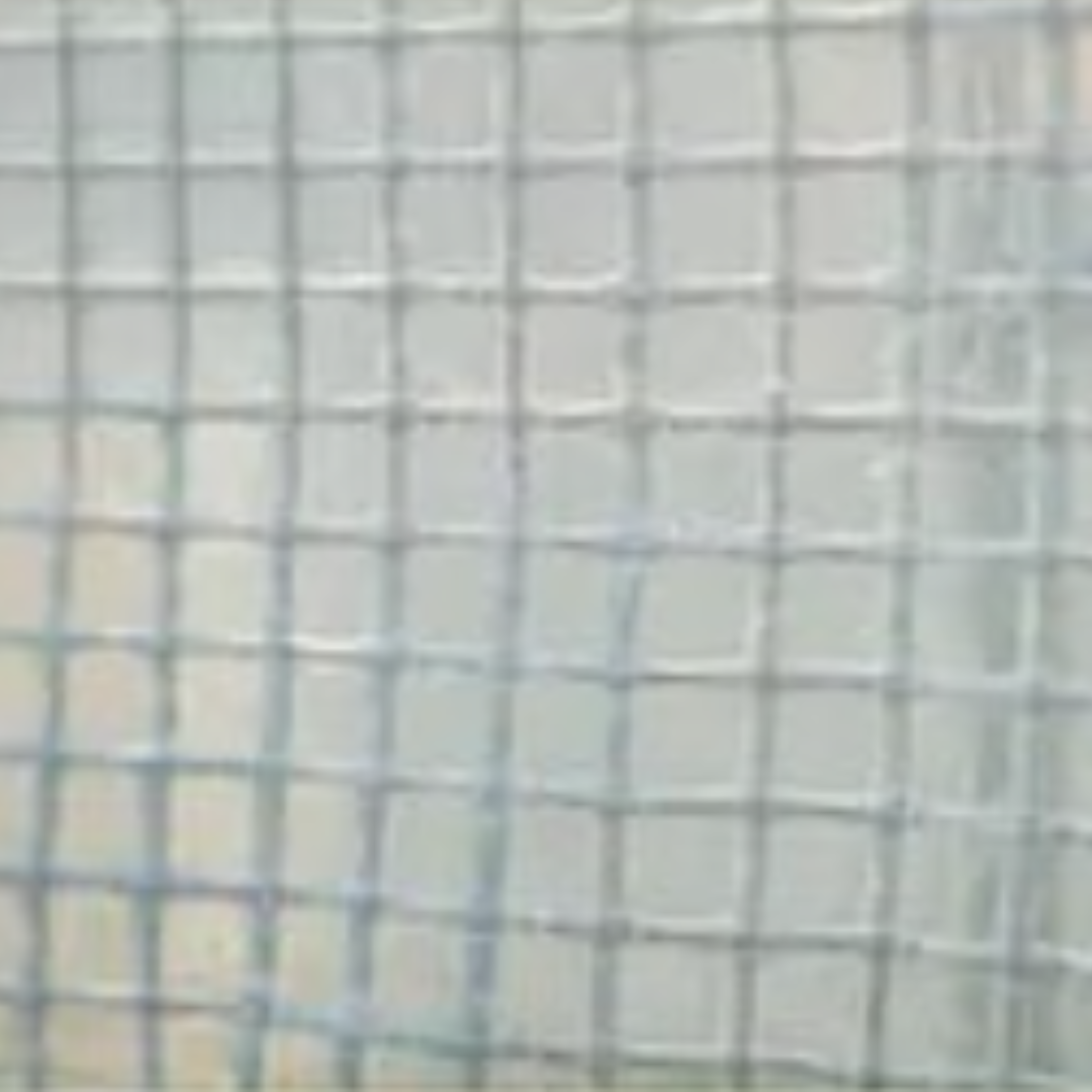 Close-up of crumpled paper on a dotted textured background.