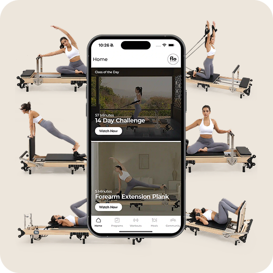 A smartphone showing a fitness app, surrounded by images of a woman exercising on a pilates reformer.