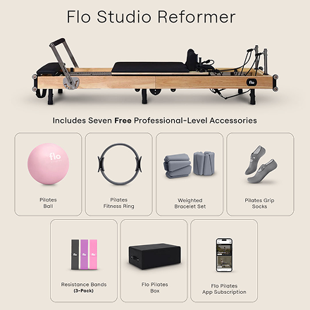 Pilates reformer machine with five accessories: ball, fitness ring, bracelet set, grip socks, app subscription.