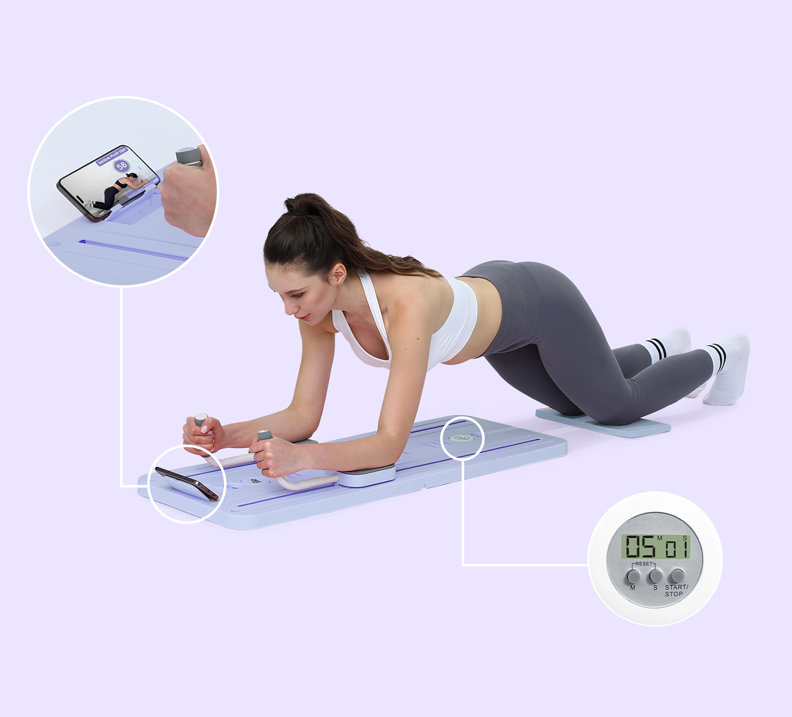 A woman in a plank position uses a piece of workout equipment with a digital timer and phone holder.
