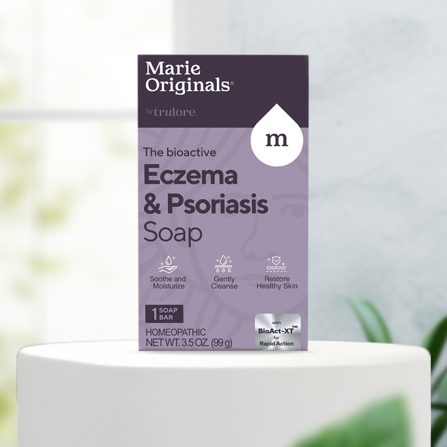 A box of Marie Originals Eczema & Psoriasis Soap sits on a white cylindrical pedestal.