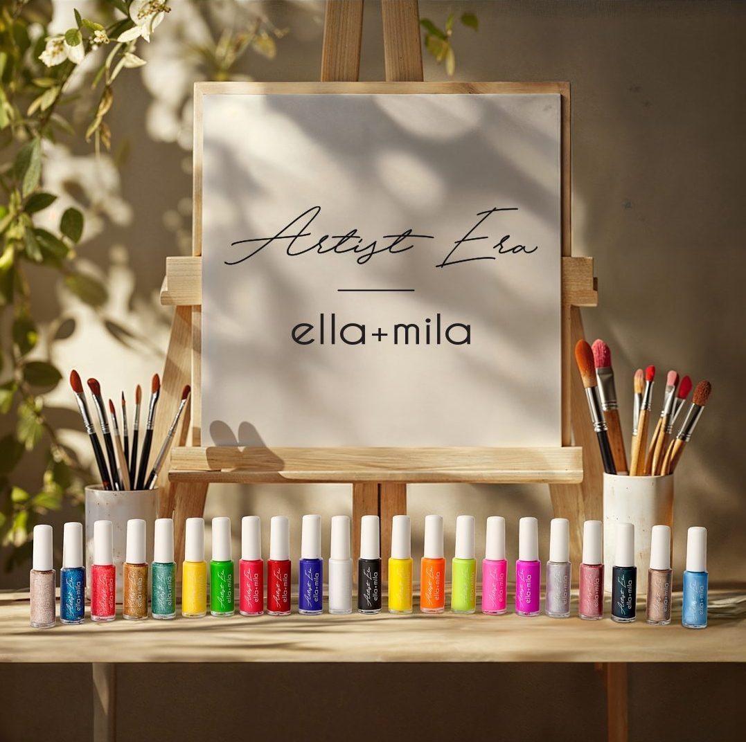 Display of colorful nail polishes and brushes with 'Artist Era ella+mila' sign.