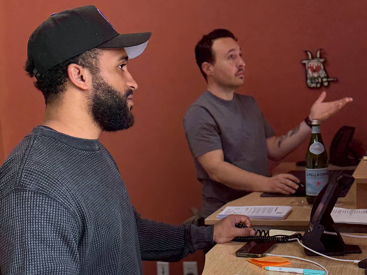 Two people collaborating in office