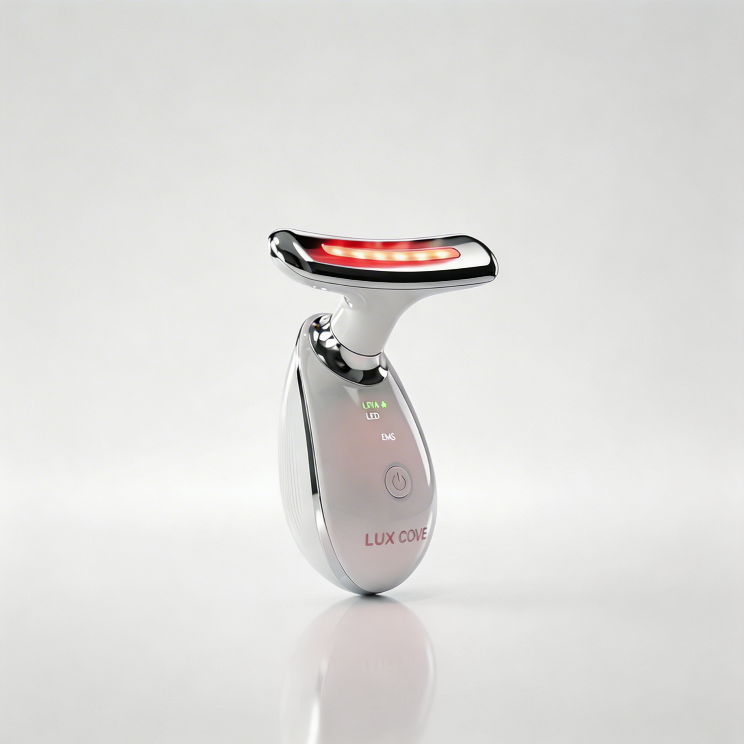 A white and chrome Lux Cove handheld beauty device with a glowing red light on a white background.