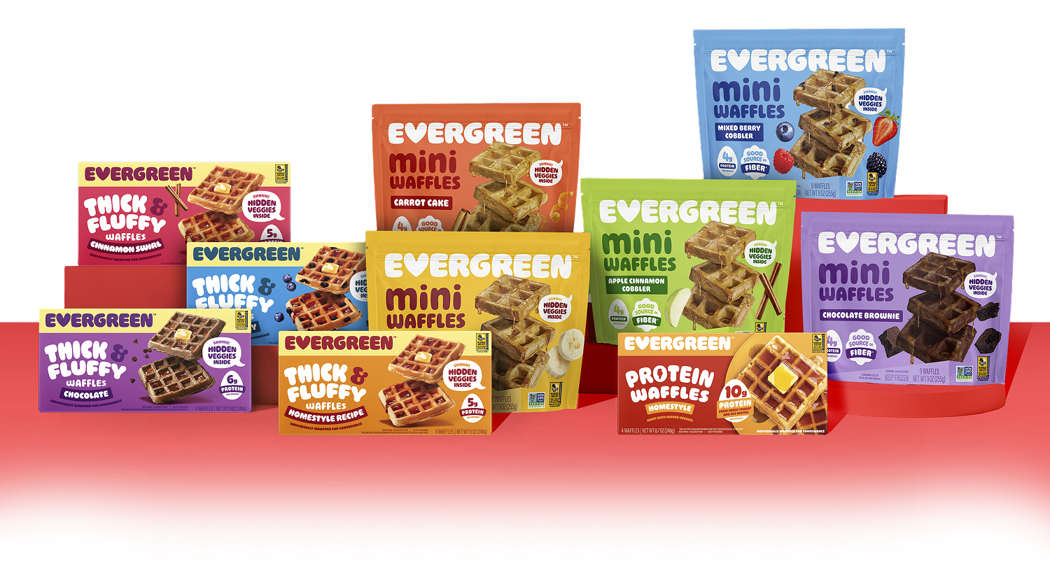 A display of various colorful boxes and bags of Evergreen brand frozen waffles against a white background.