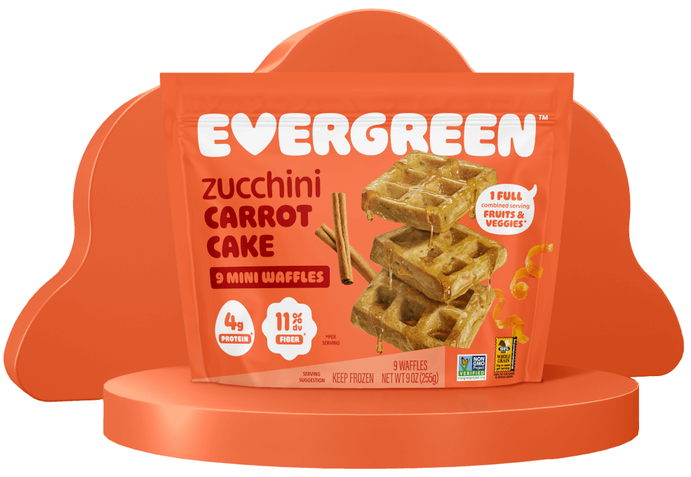 Packaging of Evergreen zucchini carrot cake mini waffles on an orange stand.