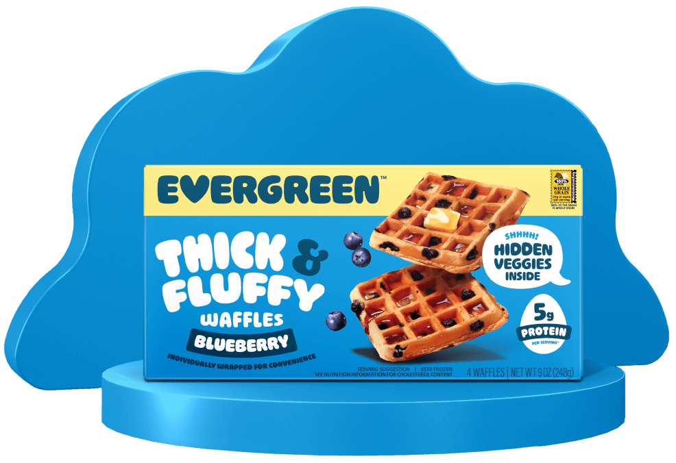 Box of Evergreen blueberry waffles with hidden veggies, on a blue cloud-shaped stand.