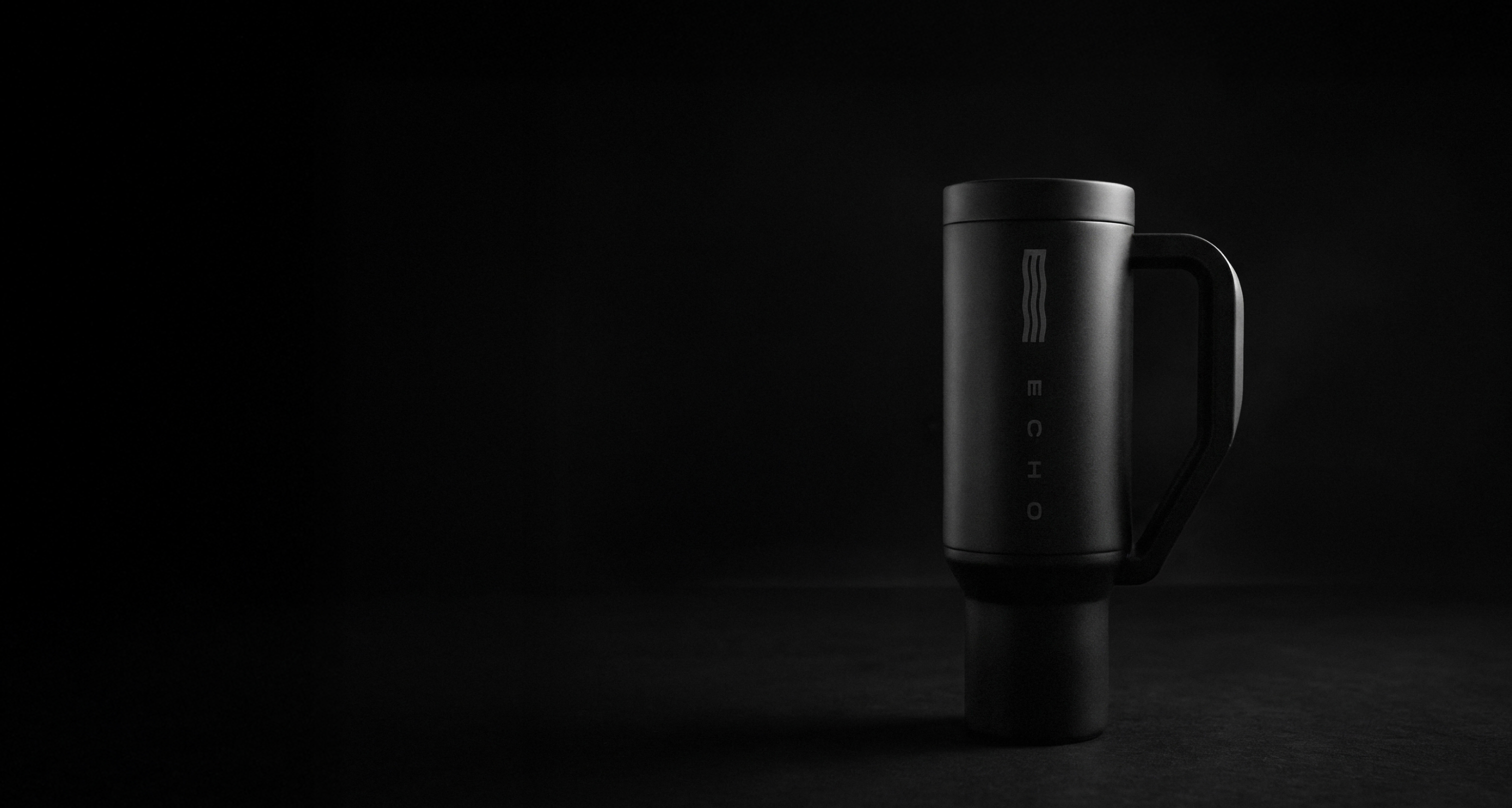 Black thermos with a handle on a dark background.