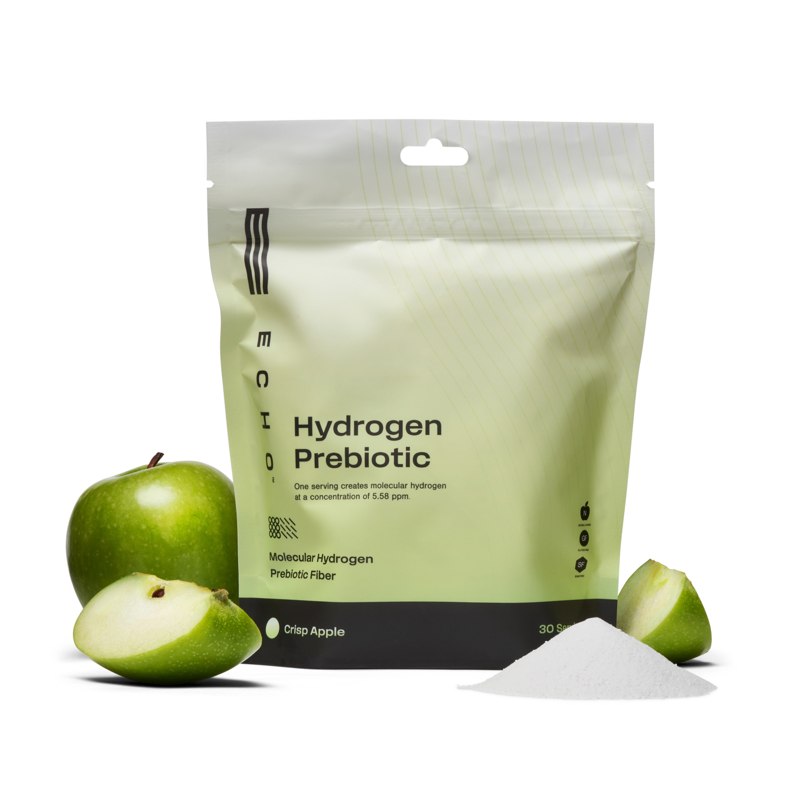 A bag of Crisp Apple flavored Hydrogen Prebiotic powder next to fresh green apples and a small pile of powder.