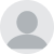A gray placeholder icon of a person's head and shoulders inside a circle.