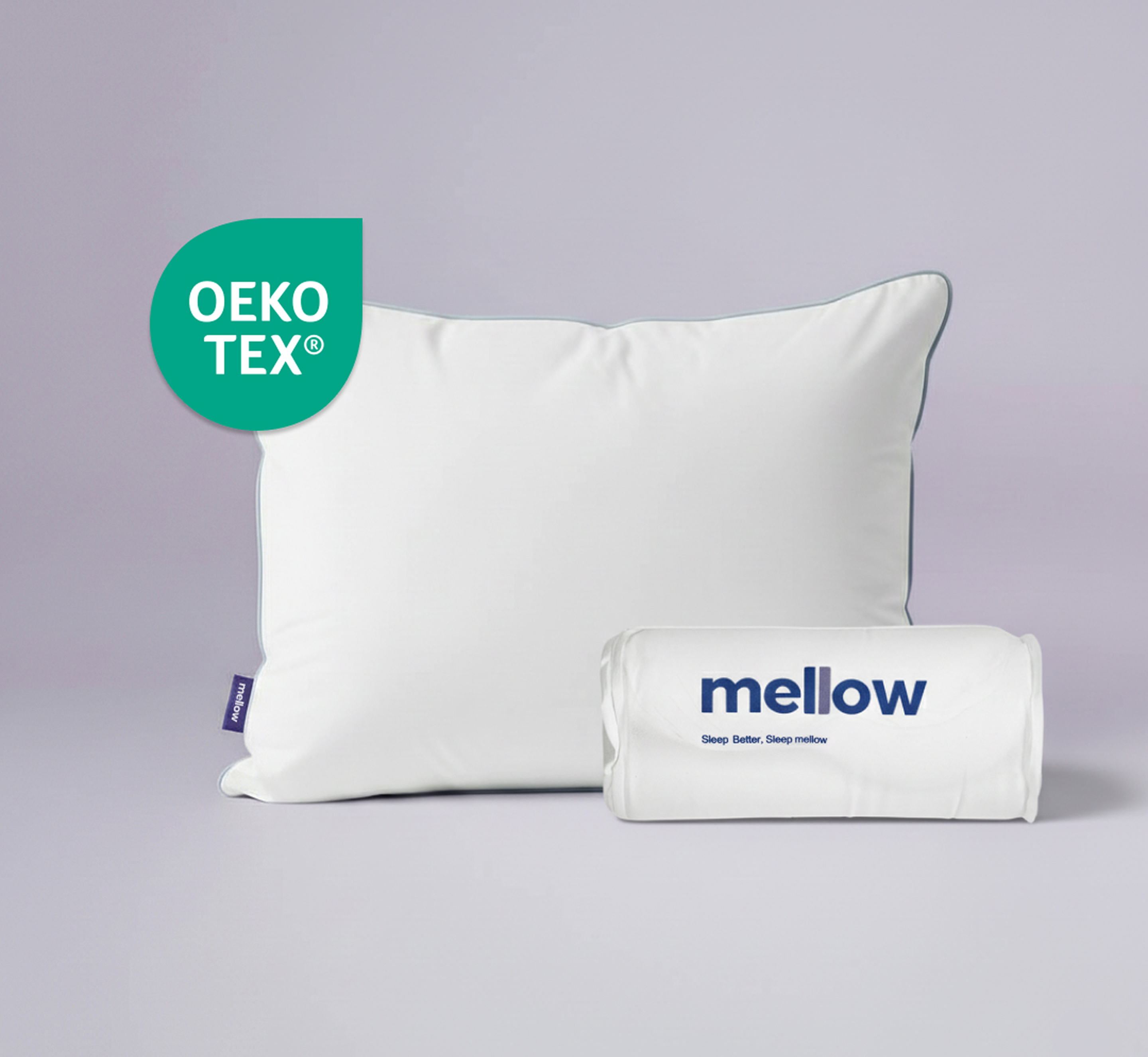A fluffed white Mellow pillow sits behind an identical pillow that is rolled up for packaging.