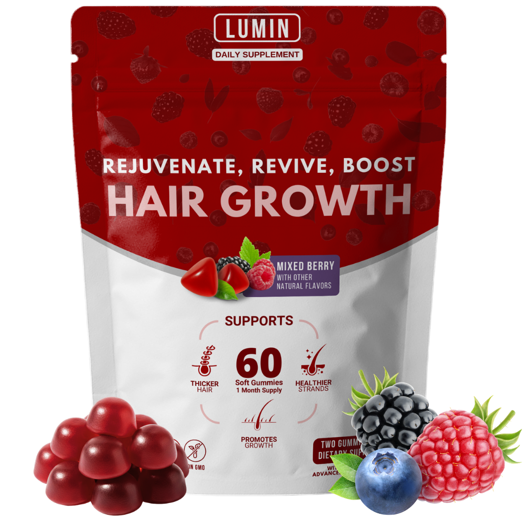 A pouch of Lumin Hair Growth mixed berry gummies, surrounded by loose gummies and fresh berries.